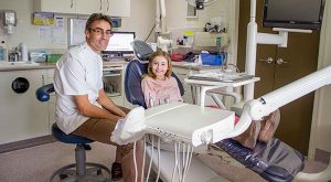 Alex Bratic Dental Care | Dentist Beenleigh | Alex with girl patient